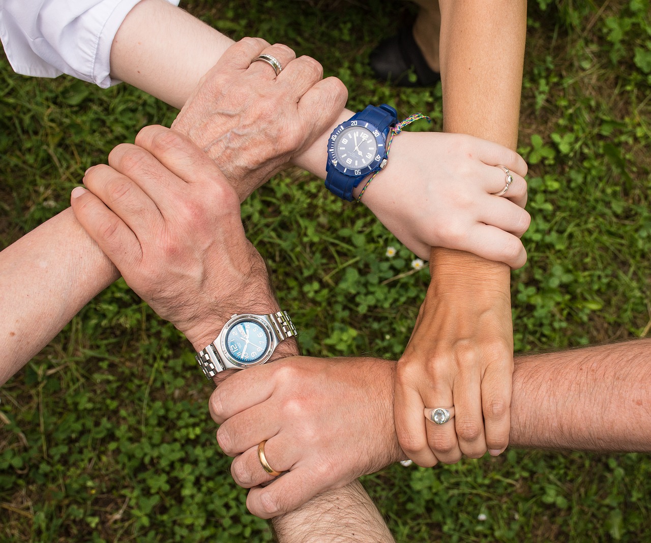 hands holding one another family support addiction treatment